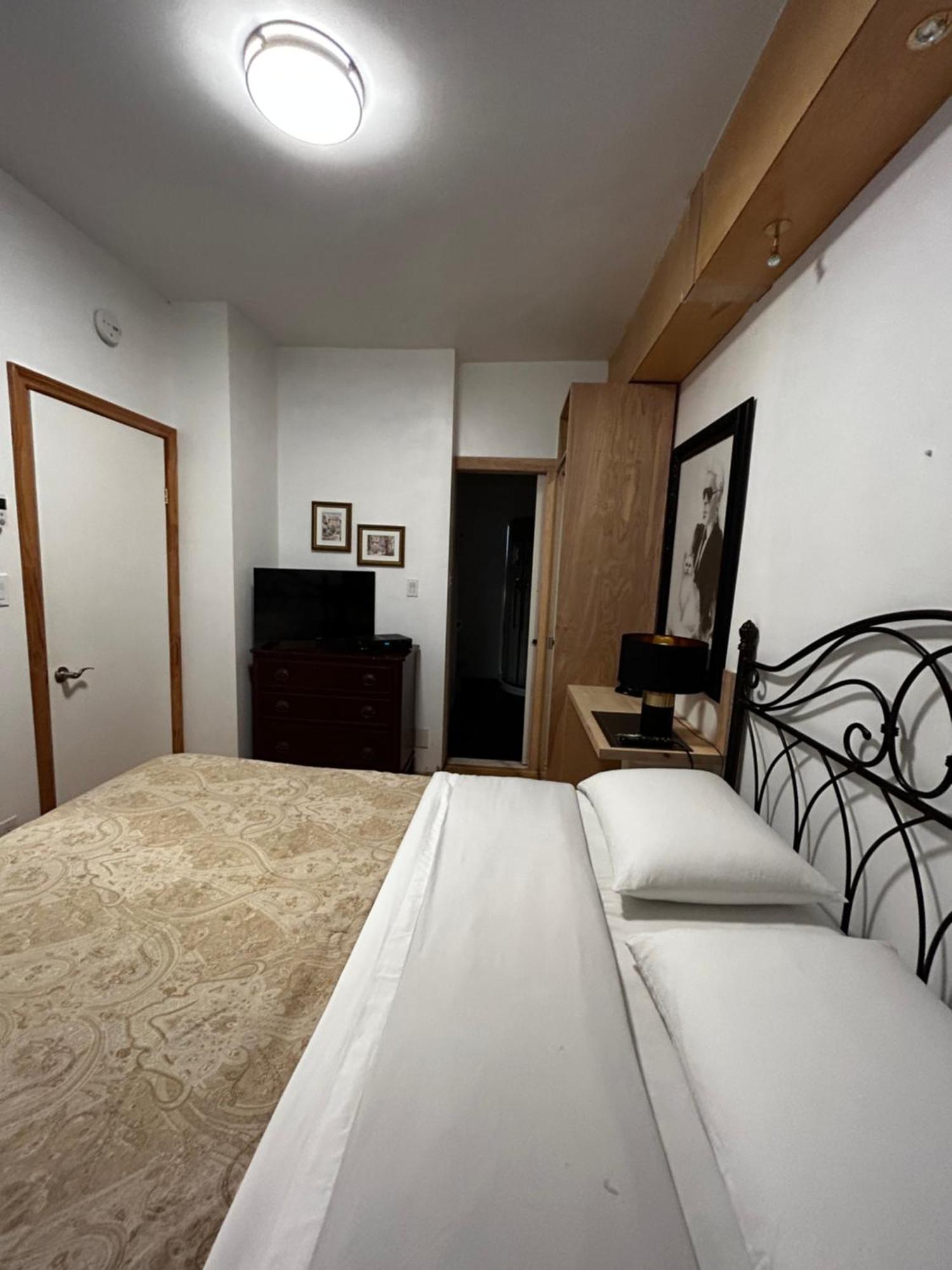 Quarto com Cama Queen-size